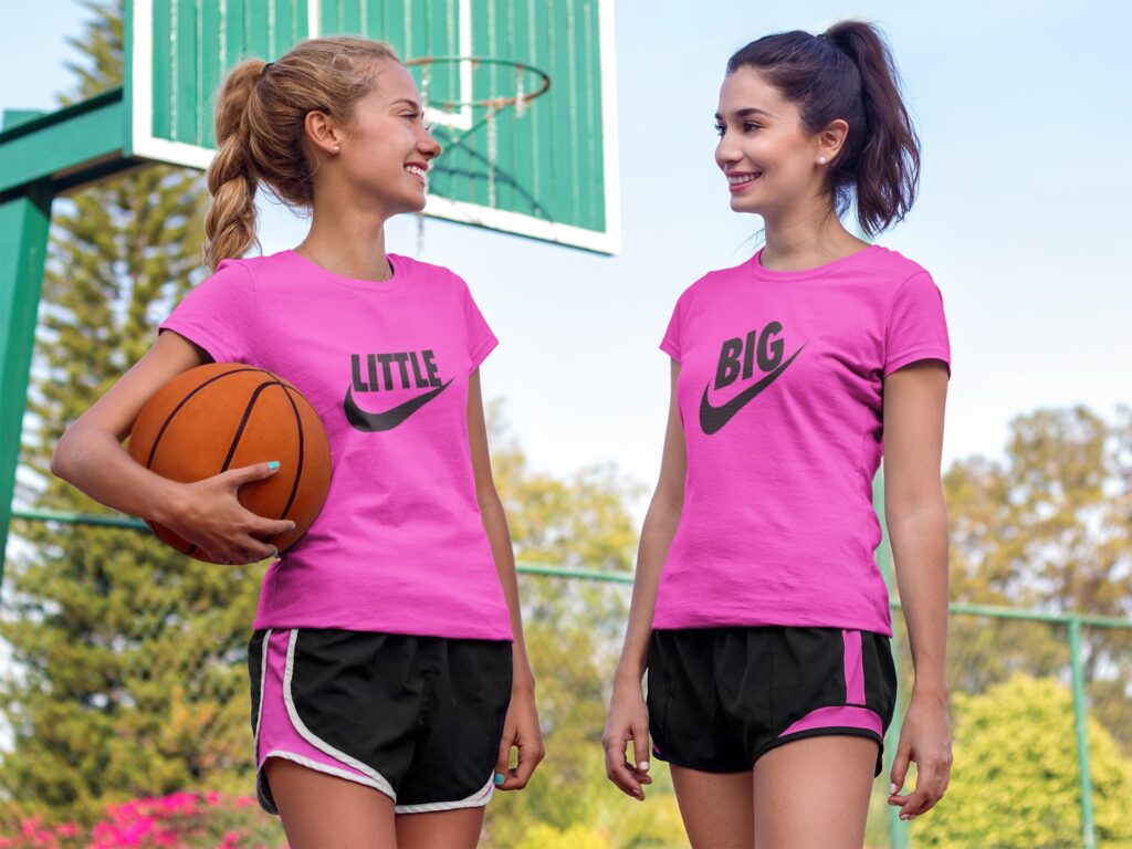 Pair of Girls Wearing Different T-Shirts